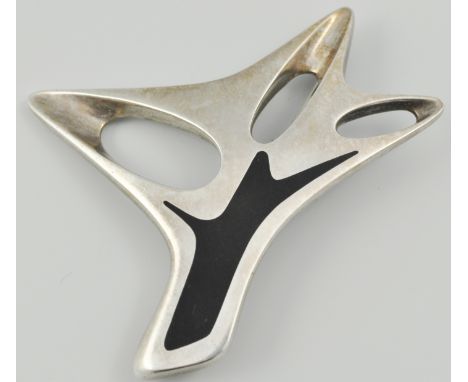 Georg Jensen, silver brooch, signed by Henning Koppel, in the form of a stylised tree with a black enamel trunk no. 323.