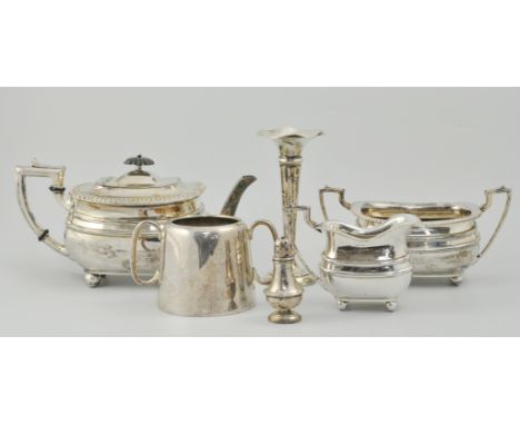 Hallmarked silver trumpet shape vase, a hallmarked silver salt, a pair of dwarf candlesticks and a electroplated tea service 