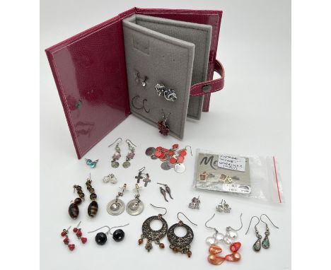 A collection of 20 pairs of drop and stud style pierced and clip on earrings. To include costume jewellery and silver. Togeth