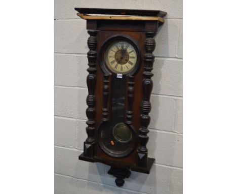 A LATE 19TH CENTURY MAHOGANY AND WALNUT VIENNA REGULATOR WALL CLOCK, with an enamel dial with roman numerals, height 113cm (w