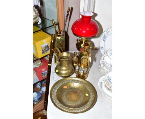 A BRASS ECCLES MINERS LAMP, an oil lamp, height including shade approximately 51cm, a brass compendium, a copper warming pan 