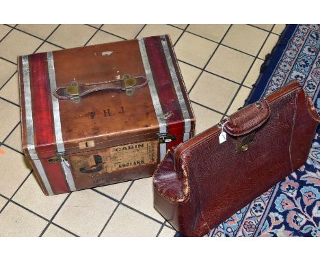 A LEATHER TRAVELLING TRUNK, stamped John Bagshaw &amp; Sons, Liverpool, with luggage labels attached, interior lined, contain