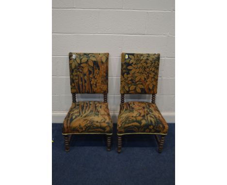 A PAIR OF BOBBIN TURNED OAK CHAIRS with forest scene upholstery (some woodworm)