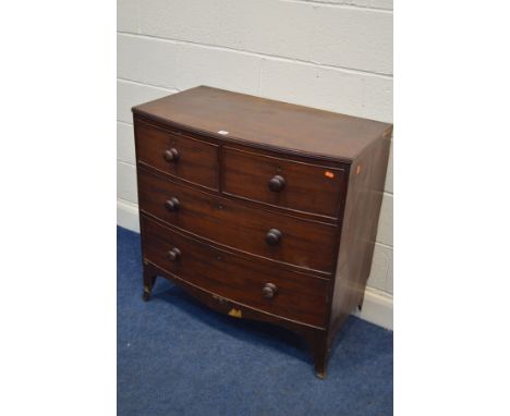 A GEORGIAN MAHOGANY BOWFRONT CHEST OF TWO SHORT OVER TWO LONG DRAWERS on tall bracket feet (missing back right left, some ven