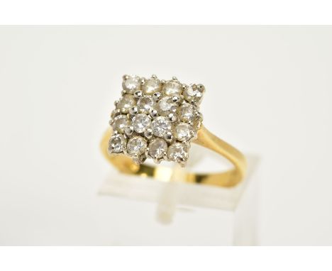 AN 18CT GOLD DIAMOND CLUSTER RING, of square design, set with sixteen round brilliant cut diamonds, tapered shoulders, total 