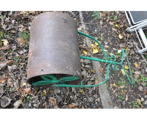 A VINTAGE CAST IRON GARDEN ROLLER with a 61cm iron roller, wrought iron detailed spokes and handle