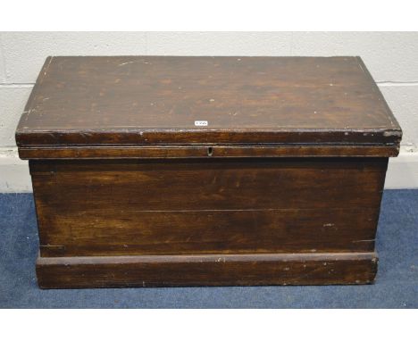 AN EARLY 20TH CENTURY WOODEN TOOL CHEST with twin handles, width 96cm x depth 49cm x height 50cm