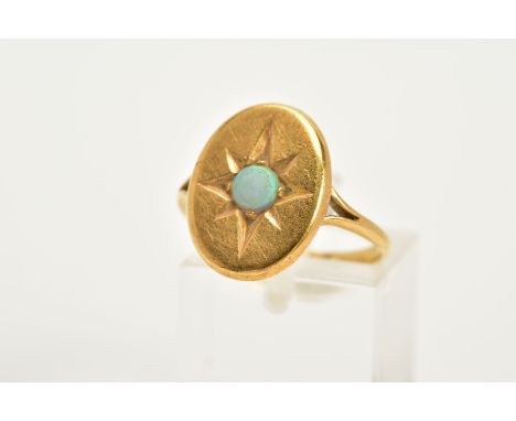 AN 18CT GOLD OPAL SIGNET RING, designed with a star set opal cabochon within a plain polished oval mount, bifurcated shoulder