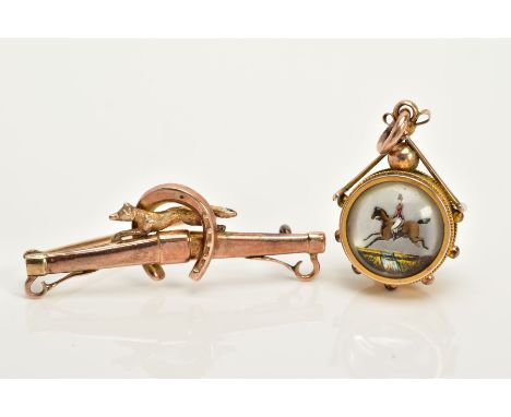 A 9CT GOLD ESSEX CRYSTAL PENDANT AND BROOCH, the double sided compass pendant depicting a hunt member on horseback, hallmarke