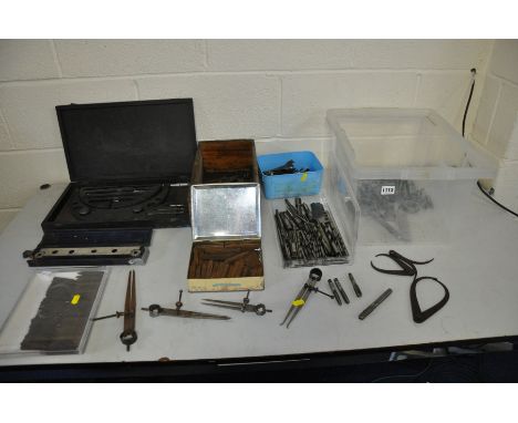 A COLLECTION OF VINTAGE ENGINEERING TOOLS including letter punches of two different sizes, taps and dies (metric and imperial