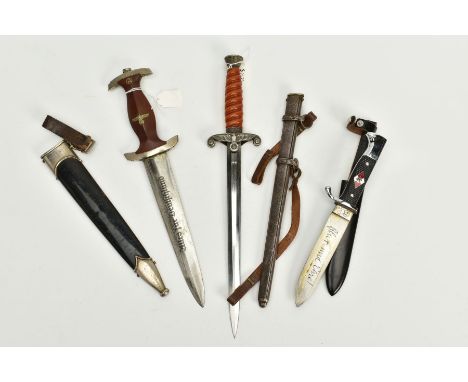 A WWII STYLE 3RD REICH GERNMAN DAGGERS, as follows Hitler Youth (jugend) black dress dagger in black leather scabbard, blade 