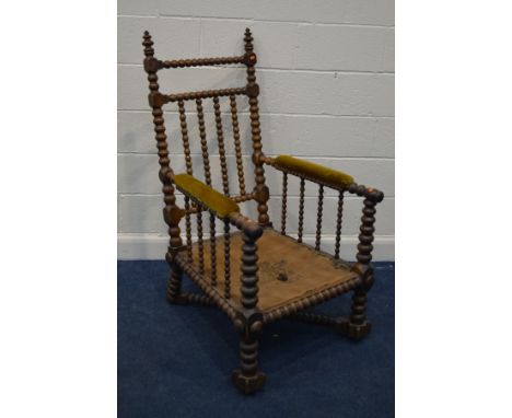 A 19TH CENTURY OAK BOBBIN TURNED THRONE CHAIR, with a cross stretchered base