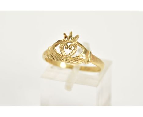 A 9CT GOLD CLADDAGH RING, the openwork ring in the form of two hands holding a heart and crown, with a 9ct gold Sheffield imp