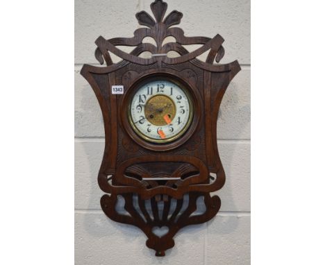 AN EARLY 20TH CENTURY CARVED WALL CLOCK, enamel dial with Arabic numerals, height 75cm (CONDITION:The front has been reglued 