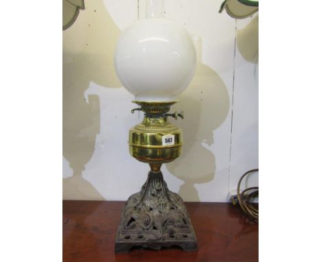 EDWARDIAN OIL LAMP, Edwardian floral cast metal base brass reservoir oil lamp with milk glass shade 