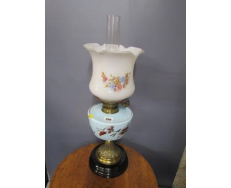 ANTIQUE OIL LAMP, Edwardian brass based oil lamp with floral painted blue glass reservoir, replacement shade 