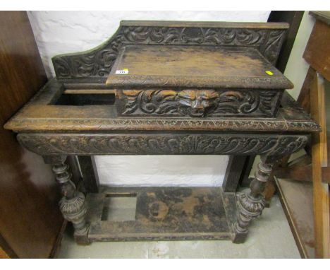 FLEMISH CARVED OAK HALL STAND, lion mask drawer facade and carved cup &amp; cover pillar supports
