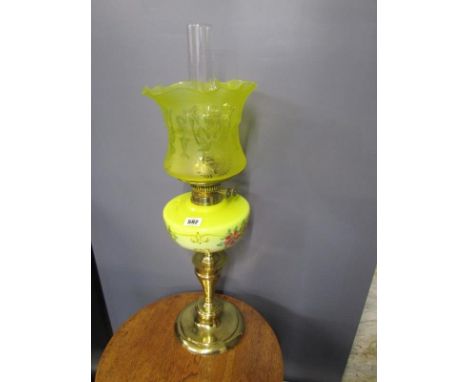 OIL LAMP, brass circular base oil lamp with painted yellow reservoir and crinoline shade 