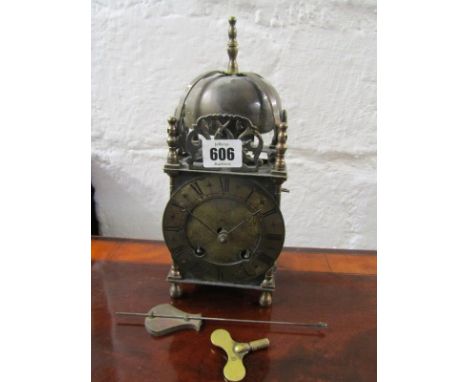 ANTIQUE BRASS FRAMED LANTERN CLOCK, the engraved face marked,16 Old Holborn Street, London. 26cm height 