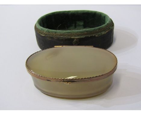 ANTIQUE OVAL ONYX SNUFF BOX, with yellow metal mounts, (tests as gold) with rising lid in fitted case, 8cm diameter 