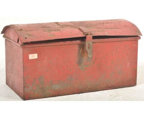 A mid 20th Century vintage industrial railway cast metal travel trunk having a domed lid, lock to the front, riveted hinges r