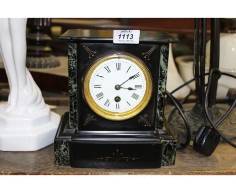 A 19th c mantle clock white enamel dial inlaid with variegated marble 8" wide x 8 1/2 "tall with pendulum