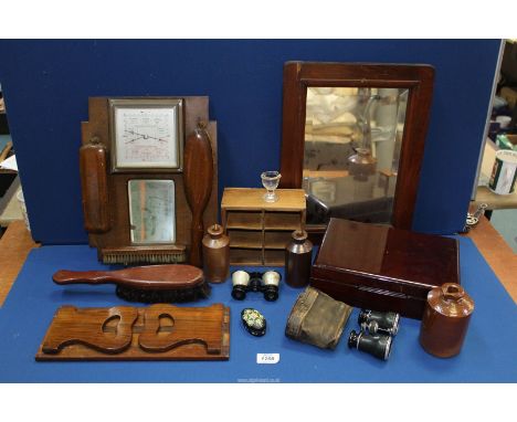 A quantity of miscellanea including a hall clothes brush set with mirror and barometer, stoneware bottles, book slide, etc.