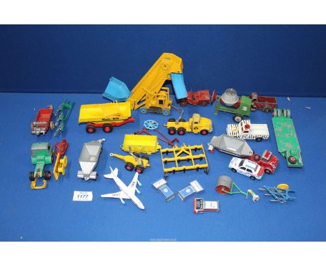 A box of assorted well used Dinky toys including a loader, cement mixer etc.