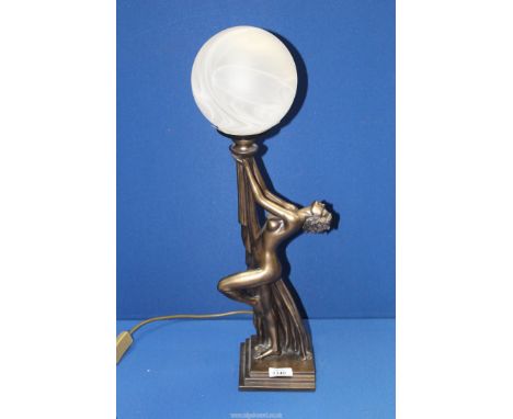 An Art Deco style figural lamp of a nude lady, with white globe shade, 22 3/4'' tall overall.