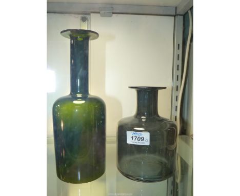 A vintage Holmegaard Gulvase by Otto Brauer, in olive green, 10" tall and a smoked glass Gulvase also by Otto Brauer, 6 1/2" 