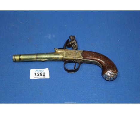A highly collectable Flintlock pocket Pistol by Willmore, London having a barrel of cannon design, the grip nicely decorated 