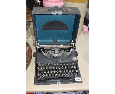 A cased Imperial typewriter.