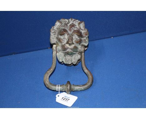 A Victorian, heavy metal Lion Mask door knocker, 5 1/4'' wide maximum (handle).