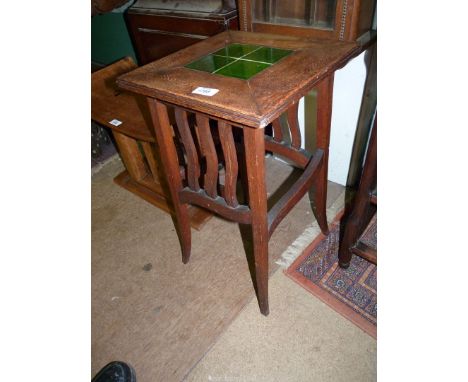 A square arts and crafts Occasional Table/Jardiniere Stand having a green tile inset top, shaped stretchers and wavy slat det