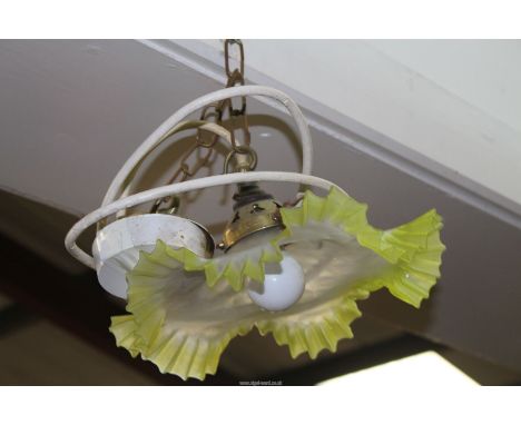 A vintage ceiling shade to white to yellow frosted glass with frilled edges, 10'' diameter.