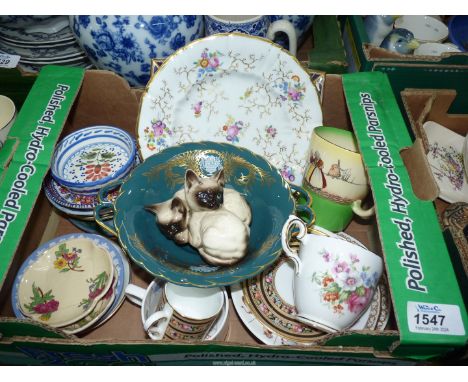 A quantity of china including Beswick Siamese kittens, Doulton, Wedgwood and Royal Worcester pin dishes, Doulton mug of a Dut