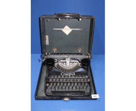 A cased Corona typewriter.