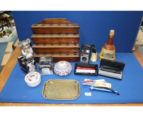 A quantity of miscellanea to include; a four tier wooden pipe display rack, Wade Bell's Whisky decanter (empty), Kodak Browni