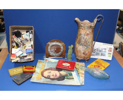 A box of miscellanea to include; 'The Malvern Pure Water Company' glass bottle, 'The Adventures of Peter Cottontail' book, vi