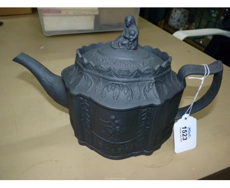 A black basalt teapot having lobed oval body, sprigged on one side with a woman and child, and on the other a putti with a sc