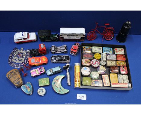 A small quantity of miscellanea to include; miniature tins, Bakelite blackout light, toy cars, lorry badge for a Dennis, etc.