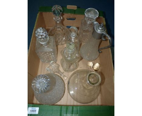 A quantity of decanters including pinched waisted decanter with crown stopper, Stuart crystal, claret jug, etc.