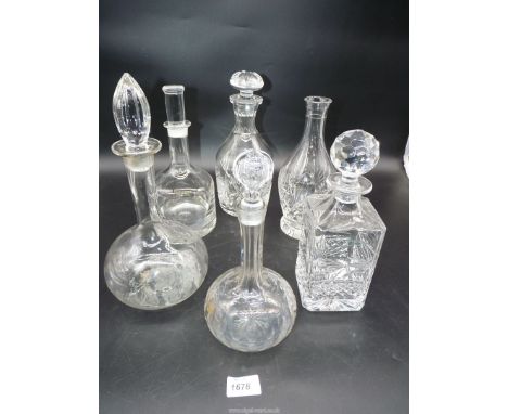 Five decanters including Galway cut glass engraved decanter and a cut glass carafe etc.