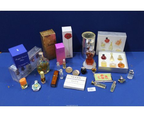 Assorted vintage perfume bottles including; Ralph Lauren, Christian Dior, 'Organza' Givenchy, etc.
