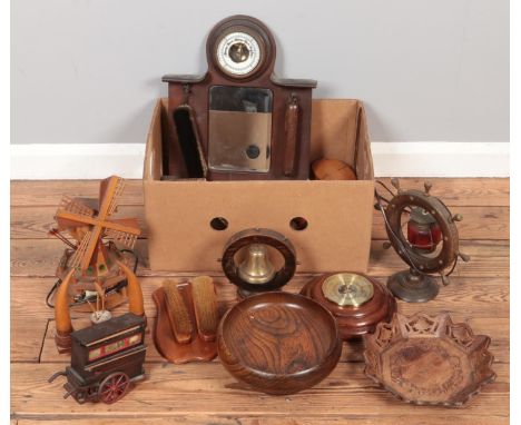 A box of woodenware. Includes brushes, trays, boxes, barometer display/stand, etc.  