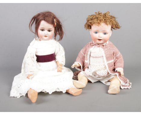 Two vintage bisque head dolls to include Schoenau &amp; Hoffmeister (1909 2x Germany) and Heubach Koppelsdorf (300.0).  