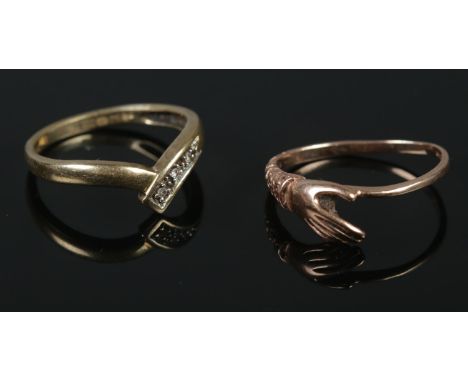 Two 9ct gold rings. Includes 9ct gold diamond wish bone ring, etc. 3.11g. Both size N.  