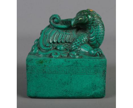 A large Chinese chop seal stamp with carved phoenix decoration.Hx11cmWx9cmDx9cm  
