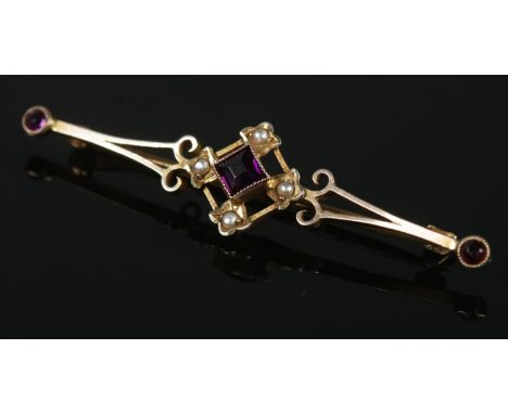 A vintage 9ct gold amethyst and seed pearl brooch. 1.88g.  