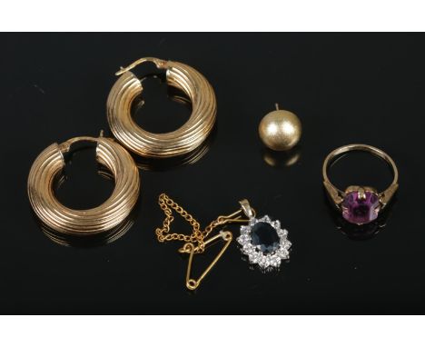 A collection of 9ct jewellery to include pair of hoop earrings, ring and pendant. Total weight 8.5g.  
